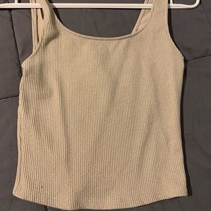 Shiny cropped tank from Dynamite